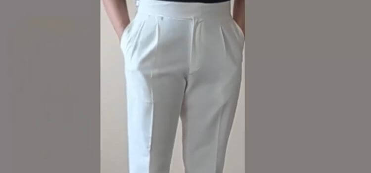 Tucked-in polo shirt with tailored trousers for a business casual outfit – How to Wear a Polo Shirt Tucked In